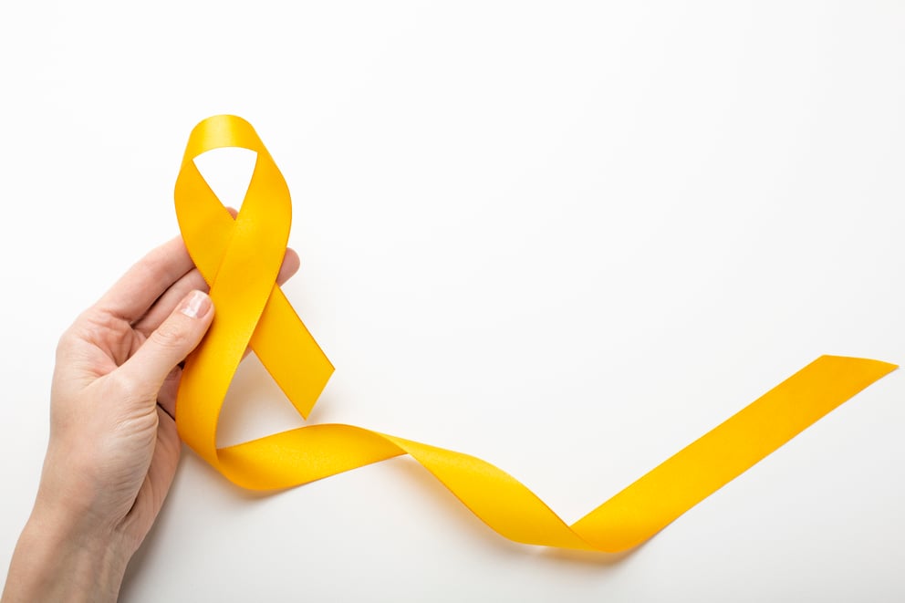 https://39930449.fs1.hubspotusercontent-na1.net/hubfs/39930449/view-yellow-ribbon-with-human-hand-1.jpg